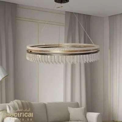 Sophisticated Crystal Chandelier Featuring A Golden Belt And Stylish Pipes